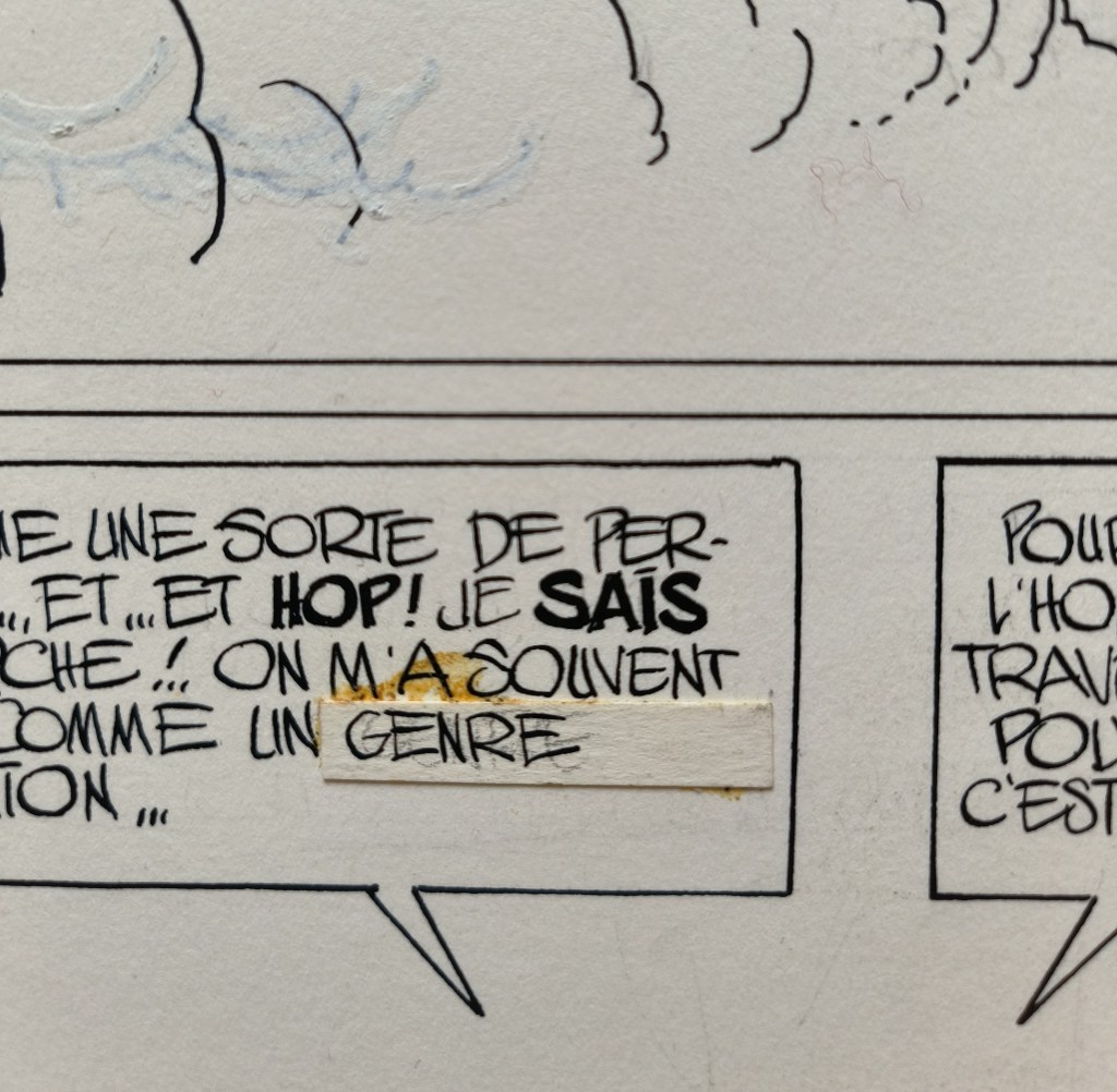 Planche de bande dessinée originale avant restauration - résidus d'adhésifs oxydés visibles en surface